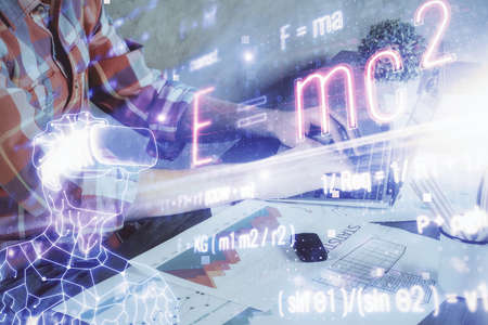 Science formula hologram with man working on computer on background. Education concept. Double...