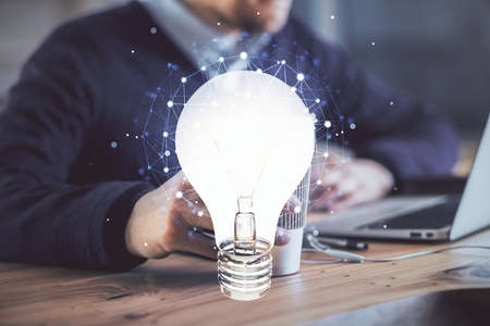 Growing arrows with businessman working on computer on background. Success concept. Double exposure.の写真素材