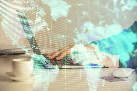 Multi exposure of woman hands typing on computer and business theme hologram drawing. Success...
