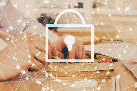 Humans hands with cyber security theme multi exposure background drawings. Concept of online...