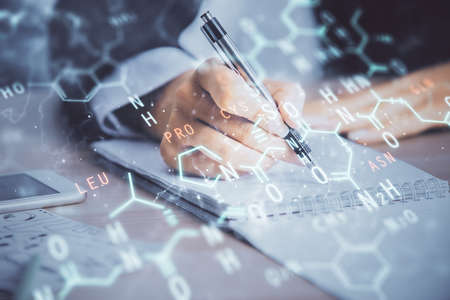 Science formula hologram over womans hands taking notes background. Concept of study. Multi exposure