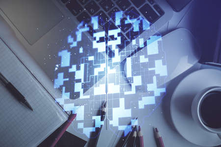 Double exposure of data drawing hologram over topview of study desk background with computer. Concept of Ai.の写真素材