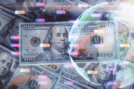 Double exposure of world map drawing over us dollars bill background. International concept.の写真素材