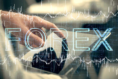Multi exposure of mans hands holding and using a phone and financial chart drawing. Market analysis concept.の写真素材
