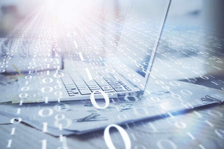 Double exposure of laptop computer and technology theme hologram. Concept of freelance work.