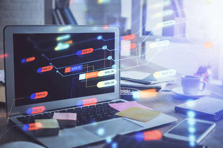 Technology theme drawing and work space with computer. Double exposure. Concept of innovation.の写真素材