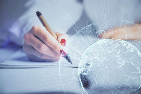 Social network theme hologram over hands taking notes background. Concept of global international people connect. Double exposureの写真素材