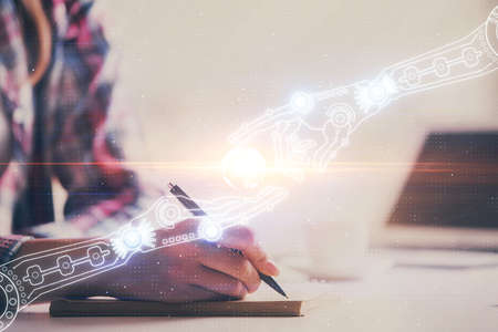 Double exposure of womans writing hand on background with data technology hud. Big data concept.の写真素材