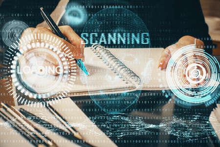 Double exposure of writing hands on background with data solution hologram on front. Technology...
