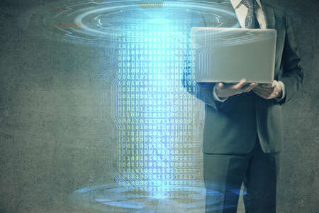 Double exposure of data internet theme hologram with man working on computer on background. Concept...