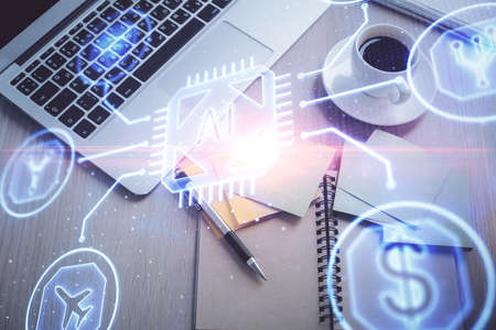 Double exposure of data theme drawing hologram over topview work table background with computer. Concept of technology.の写真素材