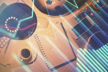 Multi exposure of forex chart drawing and work table top veiw. Concept of financial analysis.