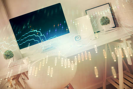 Double exposure of financial graph drawing and office interior background. Concept of stock market.の写真素材