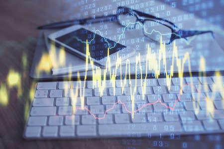 Double exposure of forex chart drawing and cell phone background. Concept of financial trading