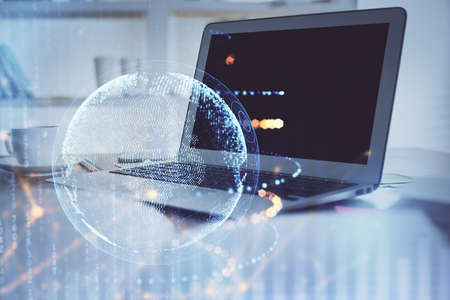 Multi exposure of table with computer and world map hologram. International data network concept.