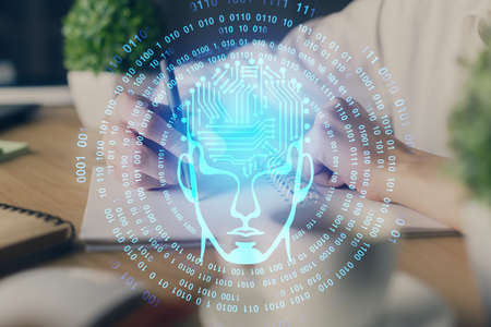 Multi exposure of writing hand on background with brain hologram. Concept of self learning.の写真素材