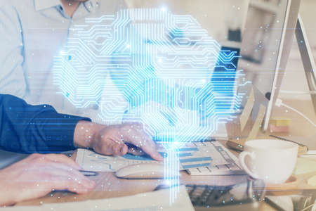 Man with computer background with brain theme hologram. Concept of brainstorm. Double exposure.の写真素材