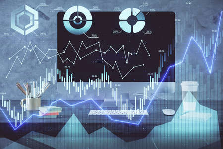 Stock market graph and table with computer background. Multi exposure. Concept of financial...