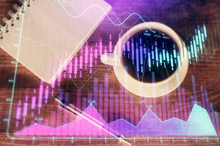 Multi exposure of forex chart drawing and work table top veiw. Concept of financial analysis.