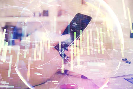 Double exposure of mans hands holding and using a phone and international business theme drawing.の写真素材