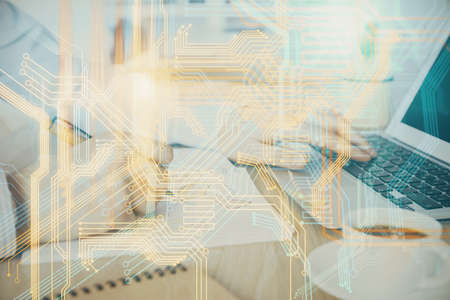Multi exposure of world map hologram with man working on computer on background. Concept of...