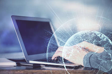 Social network theme hologram with businessman working on computer on background. Concept of world...
