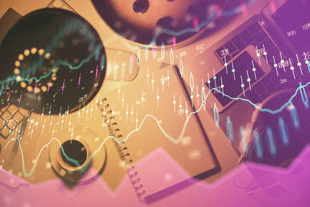 Multi exposure of forex chart drawing and work table top veiw. Concept of financial analysis.