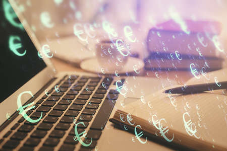 Double exposure of financial chart drawing and desktop with coffee and items on table background....