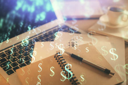 Double exposure of financial chart drawing and desktop with coffee and items on table background. Concept of forex market tradingの写真素材