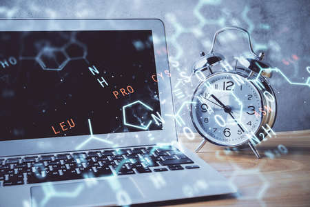 Desktop computer background and formula hologram writing. Double exposure. Education concept.