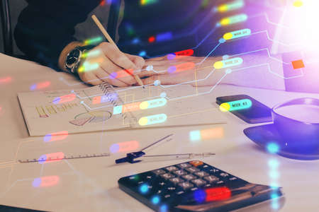 Mans hands with technology theme multi exposure icons. Concept of big data.の写真素材