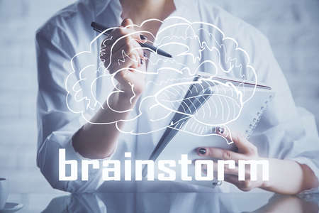 Start up creative drawing over close up hands on background. Concept of brainstorming. Multi...