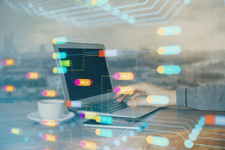 Multi exposure of technology hologram with man working on computer background. Concept of big data.