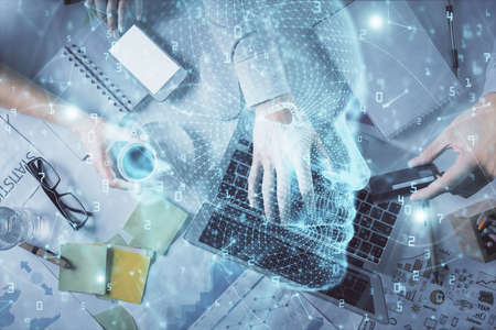 Double exposure of man and woman working together and human brain hologram drawing. Brainstorm...