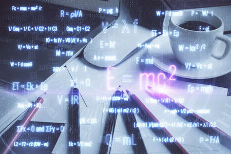 Desktop computer background and formula hologram writing. Double exposure. Education concept.