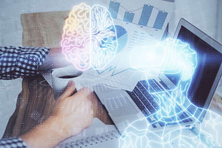 AR hologram with man working on computer on background. Augmented reality concept. Double exposure.