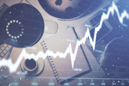 Multi exposure of forex chart drawing and work table top veiw. Concept of financial analysis.