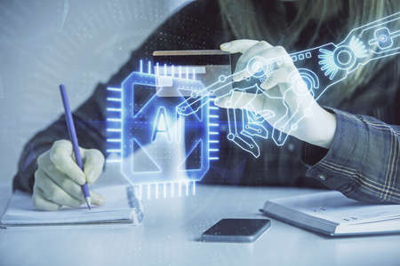 Double exposure of woman on-line shopping holding a credit card and data theme hologram drawing....
