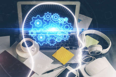 Double exposure of desktop computer and human brain drawing hologram. Ai concept.