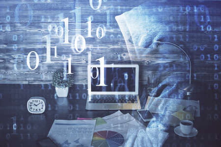 Double exposure of laptop computer and technology theme hologram. Concept of freelance work.