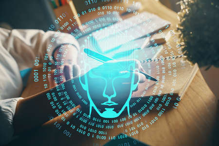 Multi exposure of writing hand on background with brain hologram. Concept of self learning.