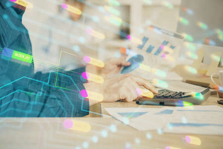 Multi exposure of tech drawings with man working on computer background. Concept of innovation.の写真素材