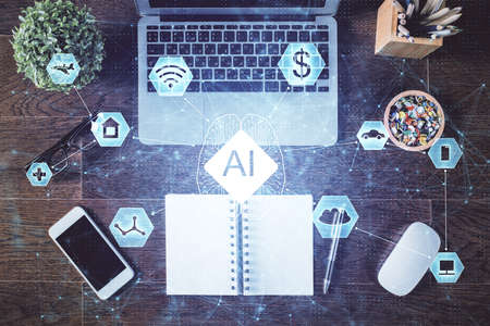 Double exposure of data theme drawing hologram over topview work table background with computer....