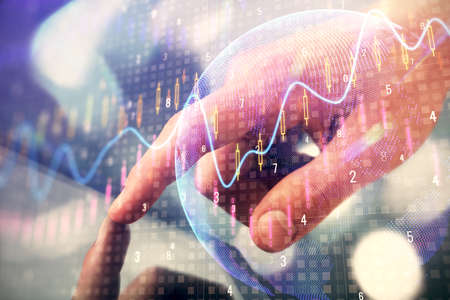 Multi exposure of mans hands holding and using a phone and financial chart drawing. Market analysis...