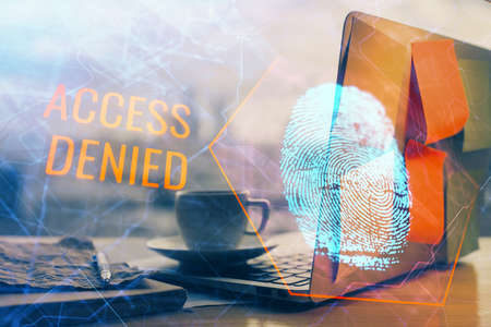 Computer on desktop in office with finger print drawing. Double exposure. Concept of business data...