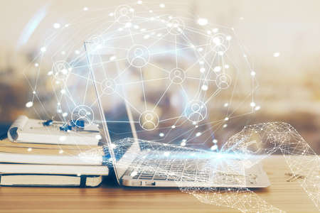 Computer on desktop with social network theme icon. Multi exposure. Concept of international...