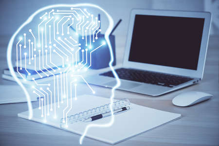 Multi exposure of work table with computer and brain hologram. Brainstorm concept.