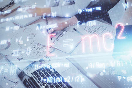 Science formula hologram over womans hands taking notes background. Concept of study. Multi exposure