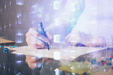 Double exposure of writing hand on background with data technology hologram. Big data concept.