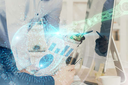Double exposure of technology hologram with man working on computer background. Concept of big data.